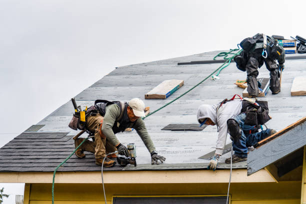 Professional Roofing technician working in Stockton, CA